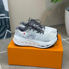 ON CLOUDULTRA 3 GRIS BLANCA